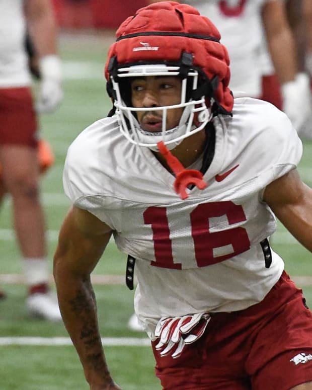 Razorbacks wide receiver Isaiah Sategna runs a route during Tuesday morning's practice